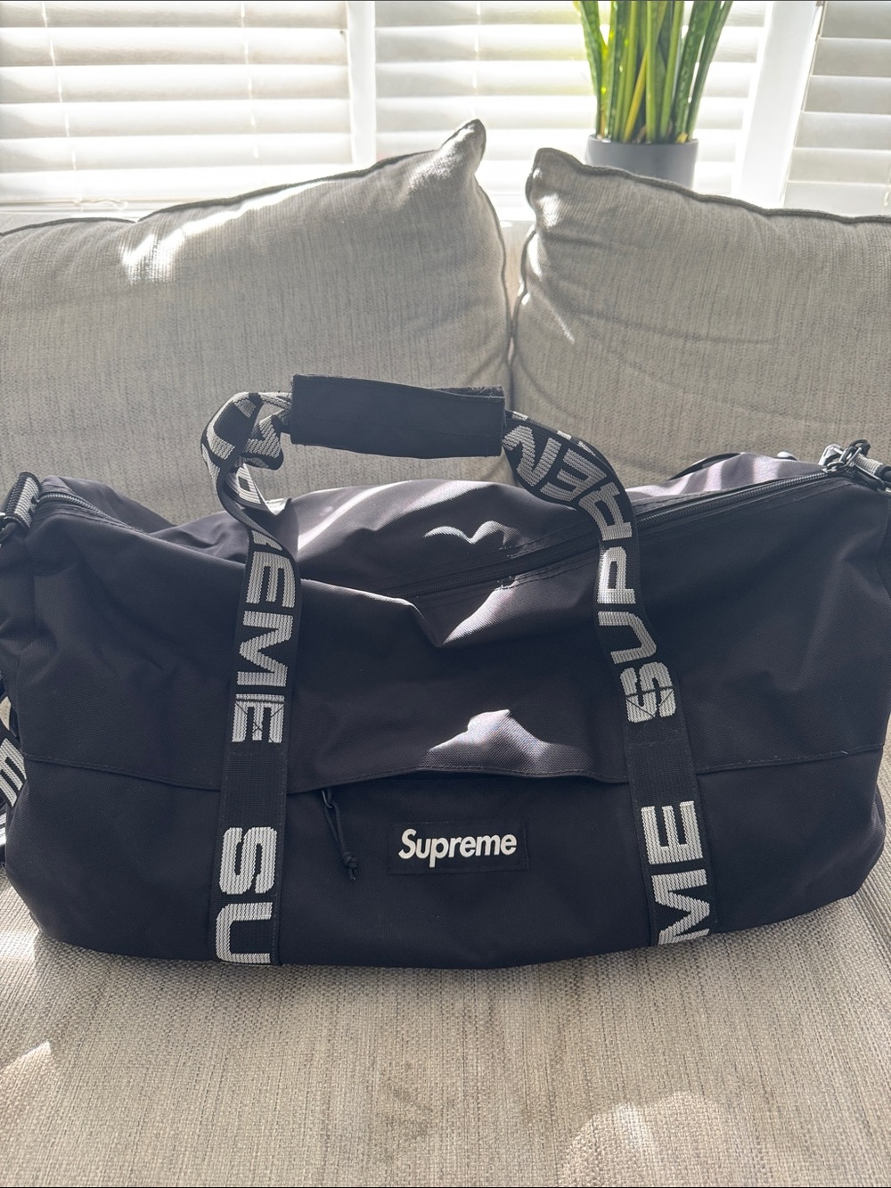 Supreme Black Duffel with White Logo Webbing